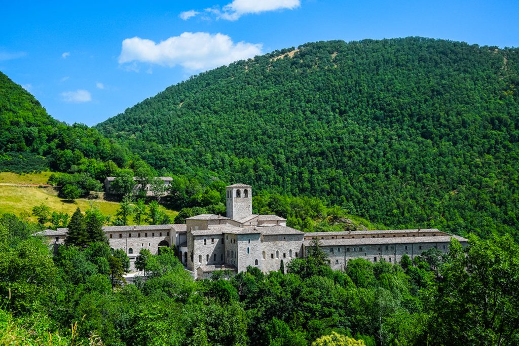 Panoramic view of the Fonte Avellana Monastery surrounded by vegetation